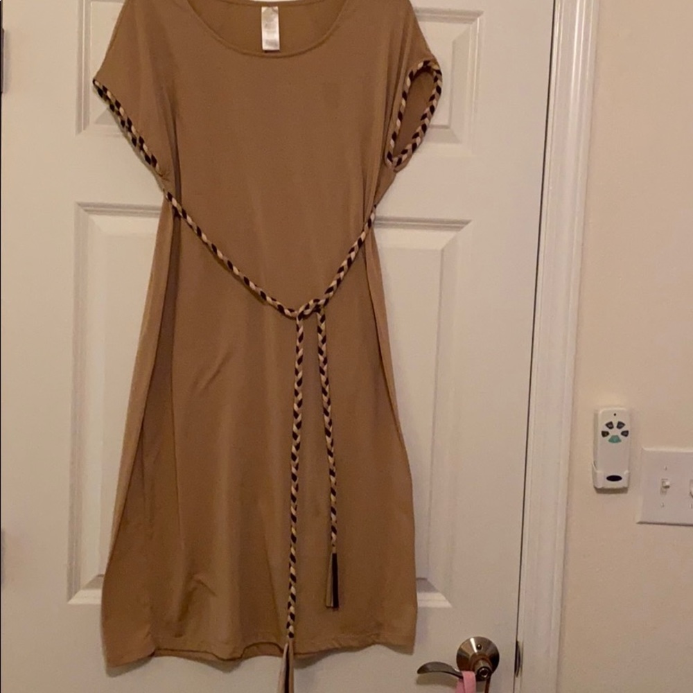 Polyester, just-below the knee dress. Worn ONCE!